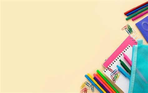 Free Photo | Top view of back to school stationery with colorful pencils and copy space