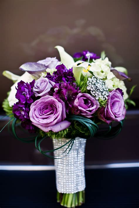 Hello Gorgeous ...Purple & White Bouquet of Roses & Lilly's with silver Bling-a-ling on the ...