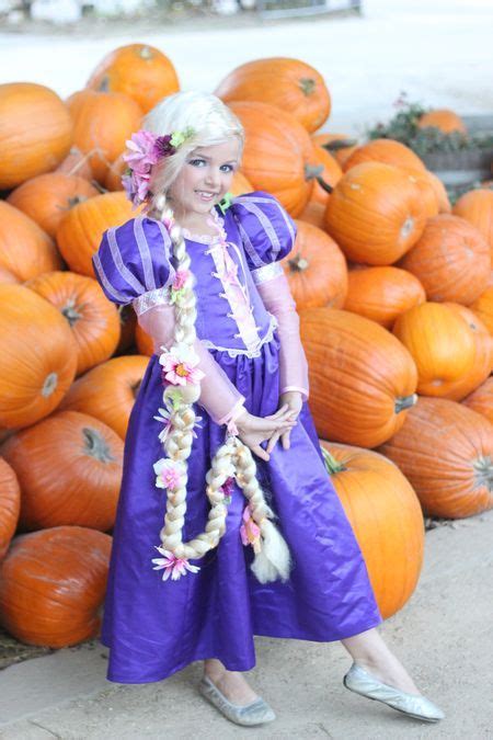 Ally's Rapunzel Costume. Dress from ETSY. Hair (that *glows*) and accessories by me. Halloween ...