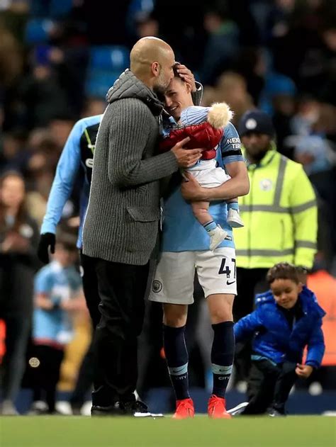 Phil Foden's baby son gets kiss from Pep Guardiola as Man City edge closer to title - Mirror Online