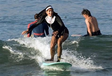 Nun Surfing In The Beach | Funny Photos | Fresh Cool Pictures