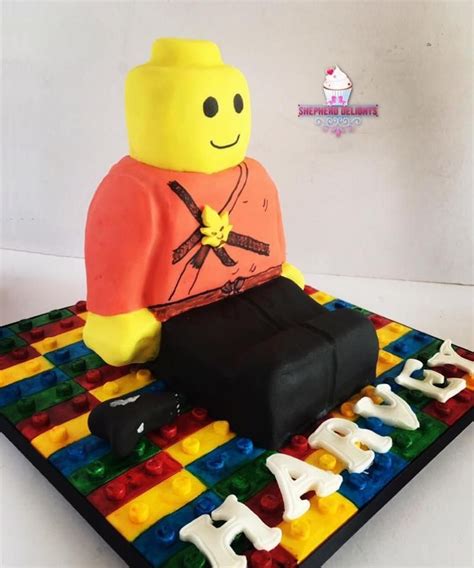 Lego Man Cake This Lego Man cake is and carved to shape, covered with fondant and decroated to ...