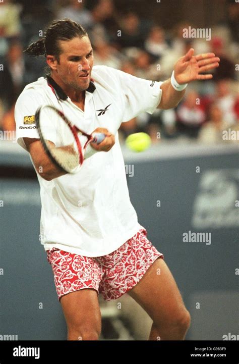 Patrick rafter plays a forehand return before retiring through injury hi-res stock photography ...