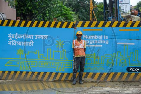 Image of A construction worker of the Mumbai Metro Rail at Churchgate-ZQ709308-Picxy