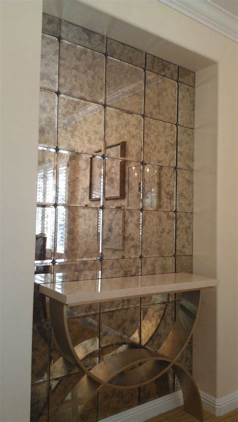 antiqued mirror tiles with rosettes | Home Decor | Antique mirror tiles, Wall mirror decor ...