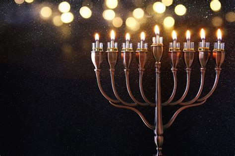 Lighting the Menorah - The Talisman