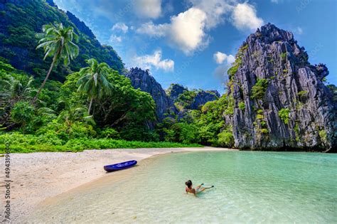 Girl at Hidden Beach in Matinloc Island, El Nido, Palawan, Philippines ...