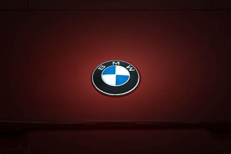 BMW Logo on Red Surface · Free Stock Photo