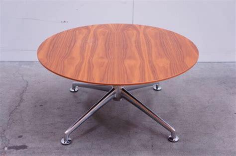 Brunner round coffee tables in walnut - Office Resale