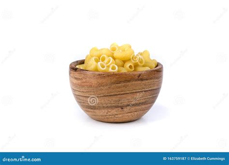 PIle of Yellow Dried Elbow Macaroni Pasta Shapes Stock Image - Image of ...