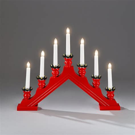 In Sweden you will see many Swedish homes with these candlestick lights ...