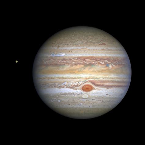 Dazzling new images of Jupiter show "remarkable new storm" moving at 350 mph - CBS News