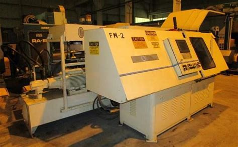 Used 15 TON INERTIA FRICTION WELDING INC HORIZONTAL "HWC015 HYBRID" CNC INERTIA FRICTIO...