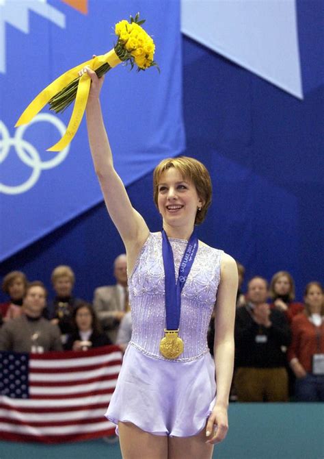 Sarah Hughes of the United States acknowledges the cheers after ...