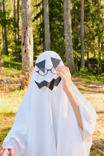 Premium Photo | Funny and scary ghost costume for halloween in the forest