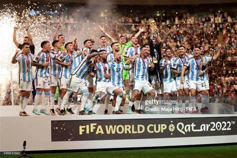 Lionel Messi of Argentina lifts the FIFA World Cup Qatar 2022... News Photo - Getty Images