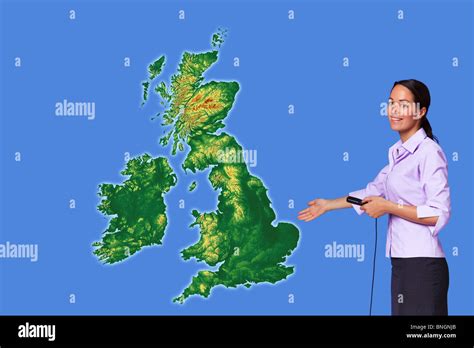 Female weather presenter with blank map of UK. Map from Google maps ...