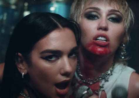 Miley Cyrus and Dua Lipa join forces on new banger “Prisoner”