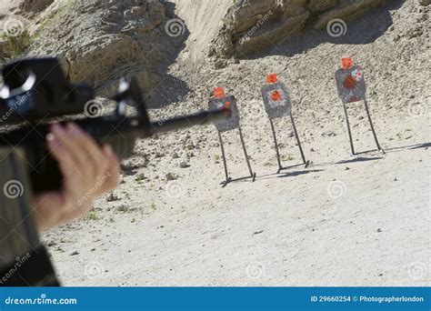 Man Aiming Machine Gun at Firing Range Stock Photo - Image of ...