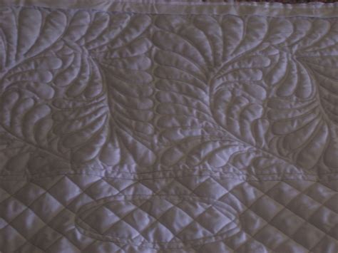 NinePatch's Quilty World: Angel Wing quilt is done