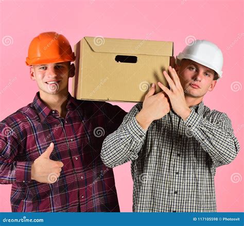 Delivery, Warehouse and Packaging Concept. Twin Brothers Stock Photo ...