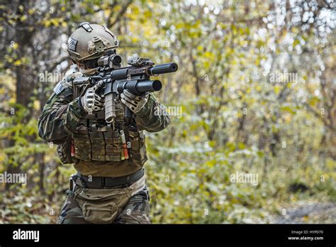 Marsoc raider aiming weapons Stock Photo - Alamy