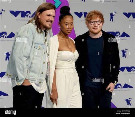 Jennie Pegouskie and Ed Sheeran (R) arrive for the 34th annual MTV ...