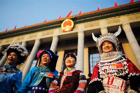 China: Ethnic minority delegates in traditional costume add colour to Beijing's National People ...