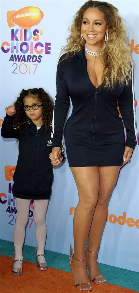 Mariah Carey and daughter Monroe wearing matching striped Adidas mini ...