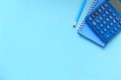 Calculator on a blue background 2296625 Stock Photo at Vecteezy