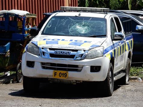 Jamaica: Partygoers stone police vehicle - Stabroek News