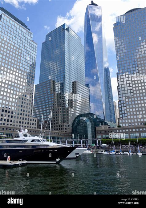 Looking across North Cove Boat Harbor at Brookfield Place Mall and One World Trade Center. New ...