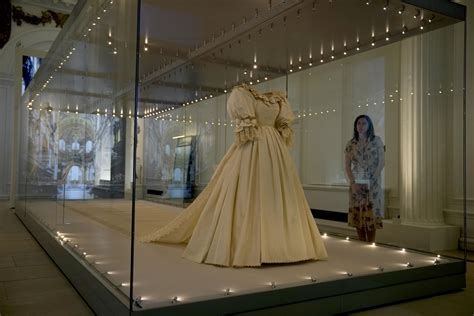 Princess Diana's wedding dress goes on display in London | AP News