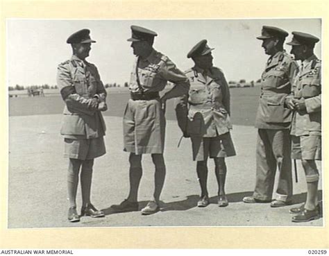 The Commander-in-Chief in the Middl East, General Sir Claude Auchinleck, and a group of officers ...