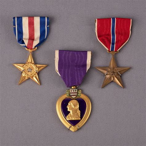 Silver Star, Bronze Star, and Purple Heart Medals awarded to Specialist Joe H. Brown ...