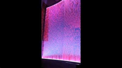 A color changing water wall created with our Lumina Panels. The entire feature was designed and ...