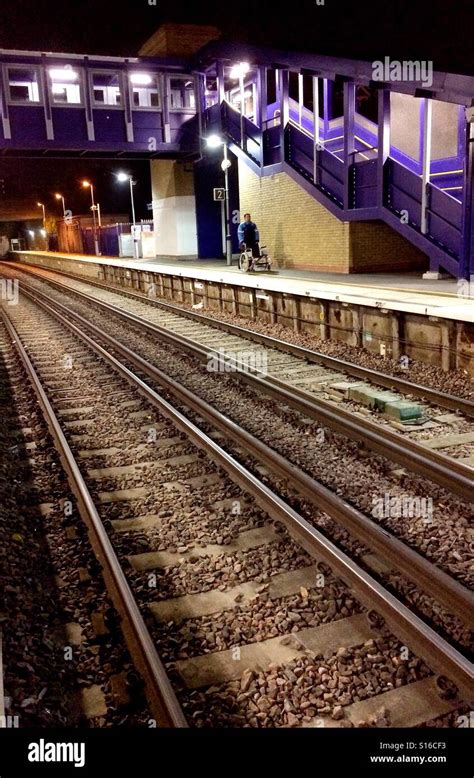 Night time railway station Stock Photo - Alamy