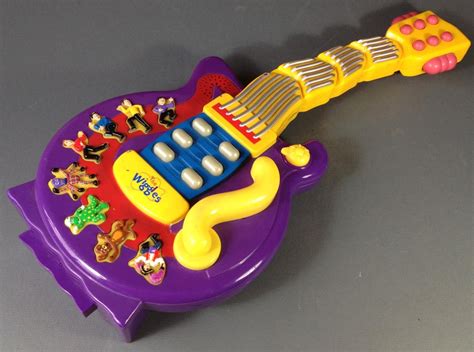 The Wiggles purple wiggly musical guitar works battery-operated GWO works | eBay