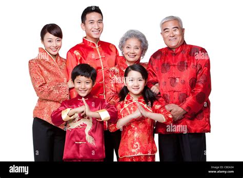 Family Dressed in Traditional Clothing Celebrating Chinese New Year Stock Photo - Alamy