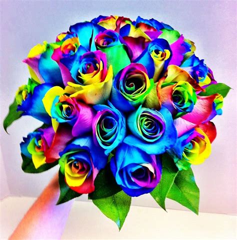 Love colour? This is the perfect wedding bouquet for you featuring beautiful rainbow roses ...