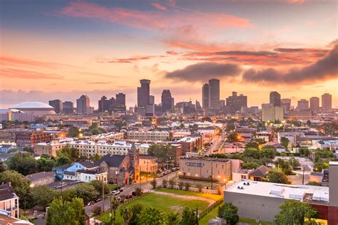 New Orleans, Louisiana, USA downtown city skyline at dawn. - Yasmin L. Stump PC Yasmin L. Stump PC