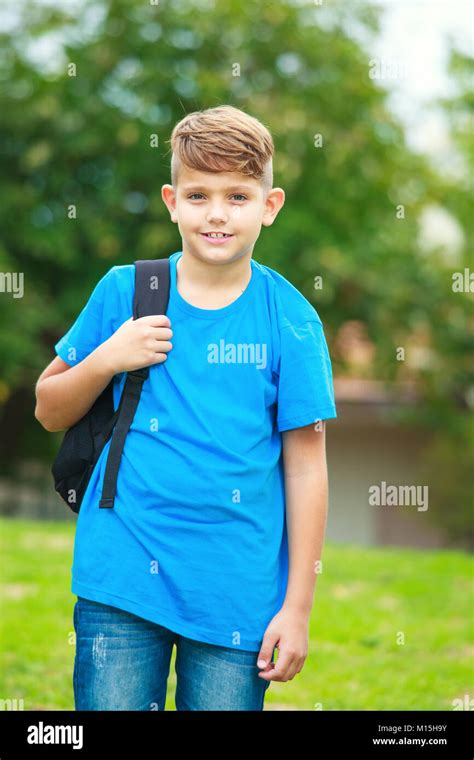 School Boy with backpack at the park Stock Photo - Alamy