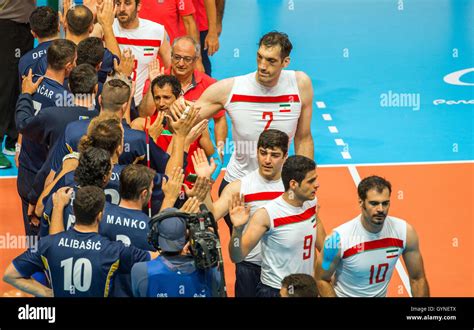 2, 46 meter tall Morteza Mehrzadselakjani of Iran celebrates together with his team after game ...