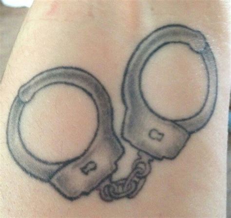 Handcuff tattoo | Friend tattoos, Tattoos, Rose tattoos