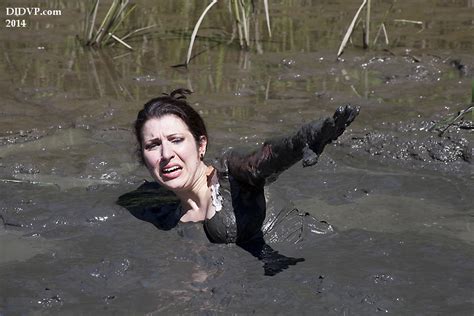 Betty sinking in Quicksand 2917 by MichaelLeachPhoto on DeviantArt