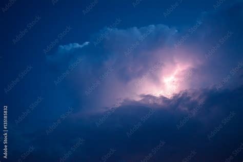 Lightnings in storm clouds. Peals of a thunder and the sparkling ...