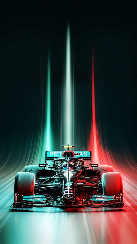 Download A Mercedes F1 Car Driving Through A Dark Tunnel Wallpaper | Wallpapers.com