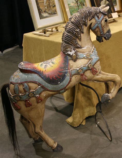 Our antique carousel horse is also attracting lots of attention at the show. We bought this 19th ...