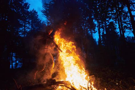 Soldier in Action at Night jumping over fire 11616148 Stock Photo at Vecteezy