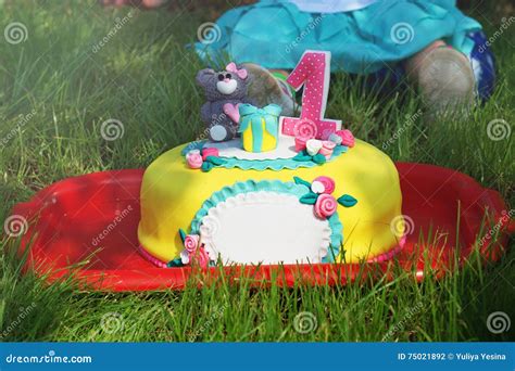 Big Yellow Cake with Number One and Decoration Stock Photo - Image of ...